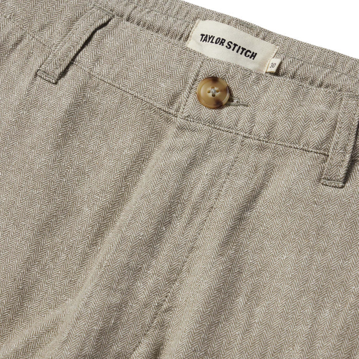material shot of the button closure on The Easy Pant in Olive Herringbone