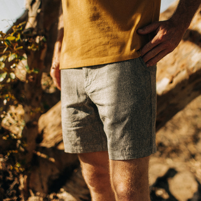 fit model standing in The Easy Short in Charcoal Herringbone