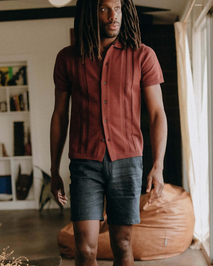 fit model walking wearing The Easy Short in Navy Linen