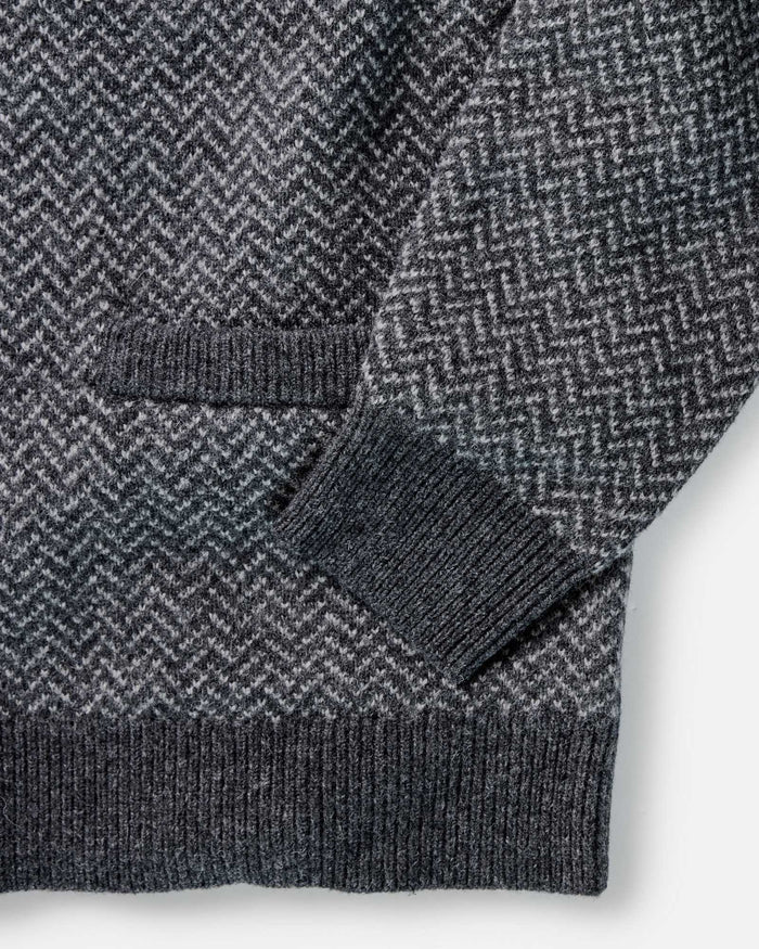 material shot of the cuffs on The Eddy Cardigan in Heather Charcoal Herringbone