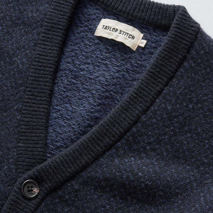 material shot of the neck on The Eddy Cardigan in Heather Marine Herringbone