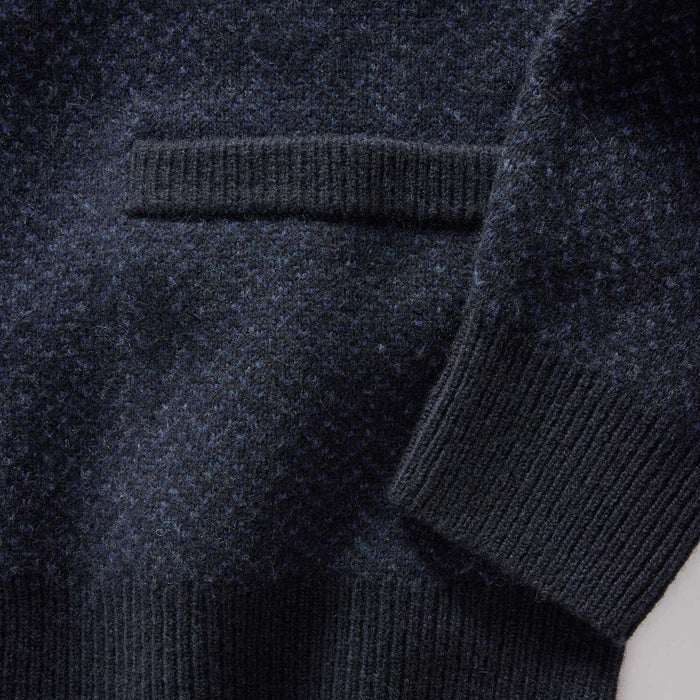 material shot of the sleeve on The Eddy Cardigan in Heather Marine Herringbone