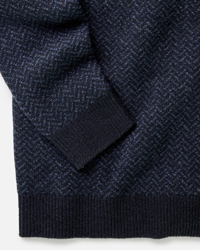 material shot of the cuff on The Eddy Crew in Heather Marine Herringbone