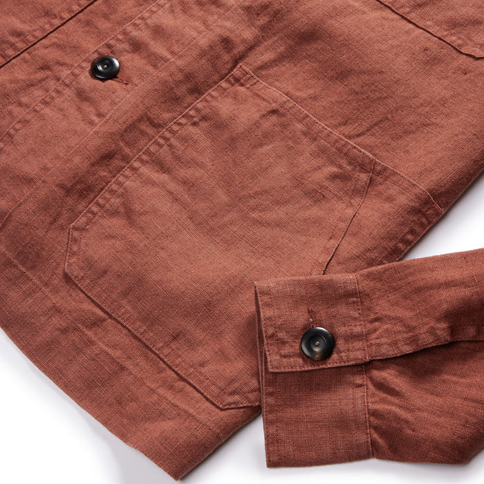material shot of the pockets and horn buttons on The Embroidered Ojai in Dried Guajillo Hemp