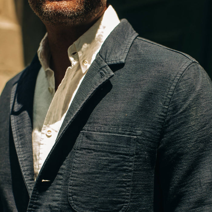 fit model wearing The Emerson Jacket in Navy Double Cloth, chest detail