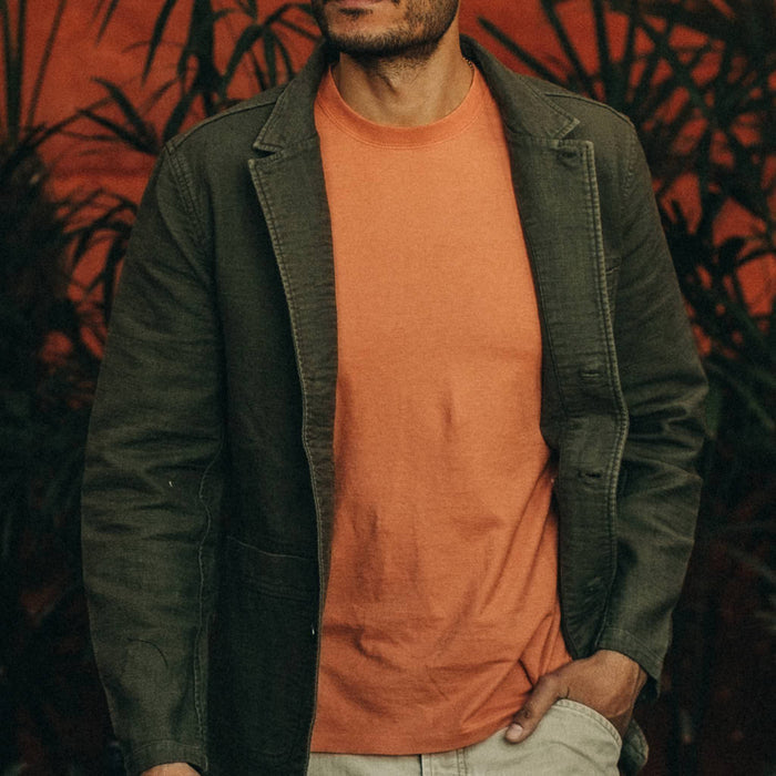 fit model wearing The Emerson Jacket in Olive Double Cloth, hand in pocket