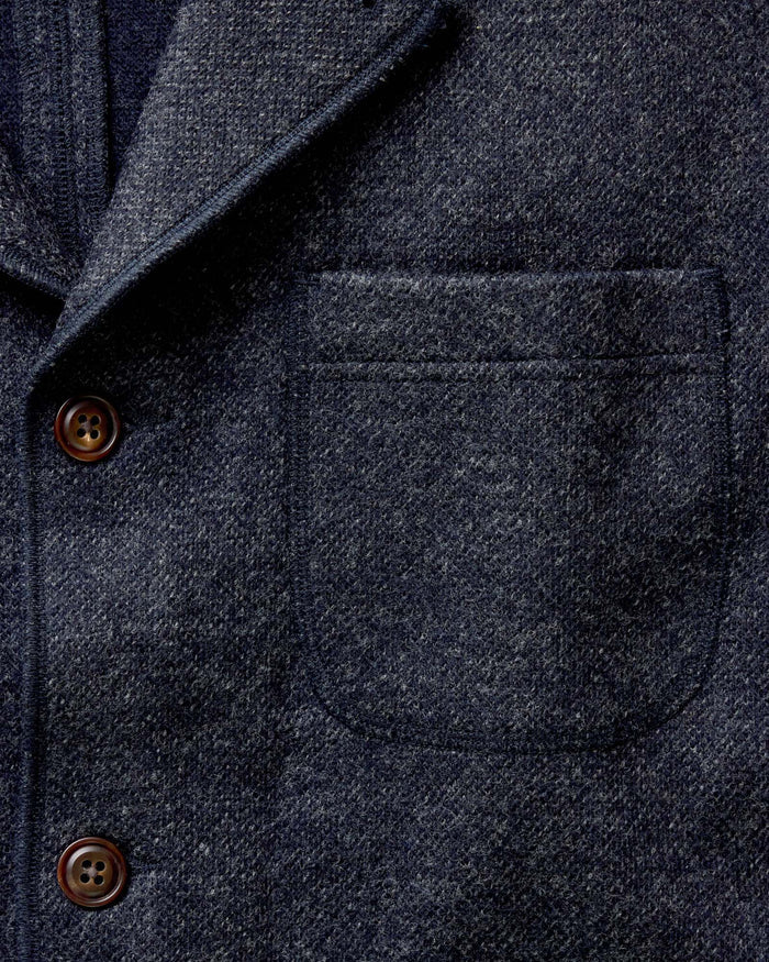 material shot of the lapel on The Ridgewood Cardigan in Navy Birdseye Wool