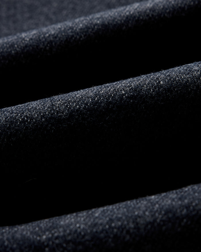 material shot of the front pockets on The Ridgewood Cardigan in Navy Birdseye Wool