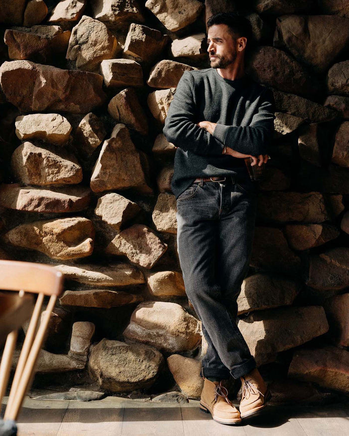 fit model crossing his arms in The Evans Crew in Charcoal Birdseye Wool