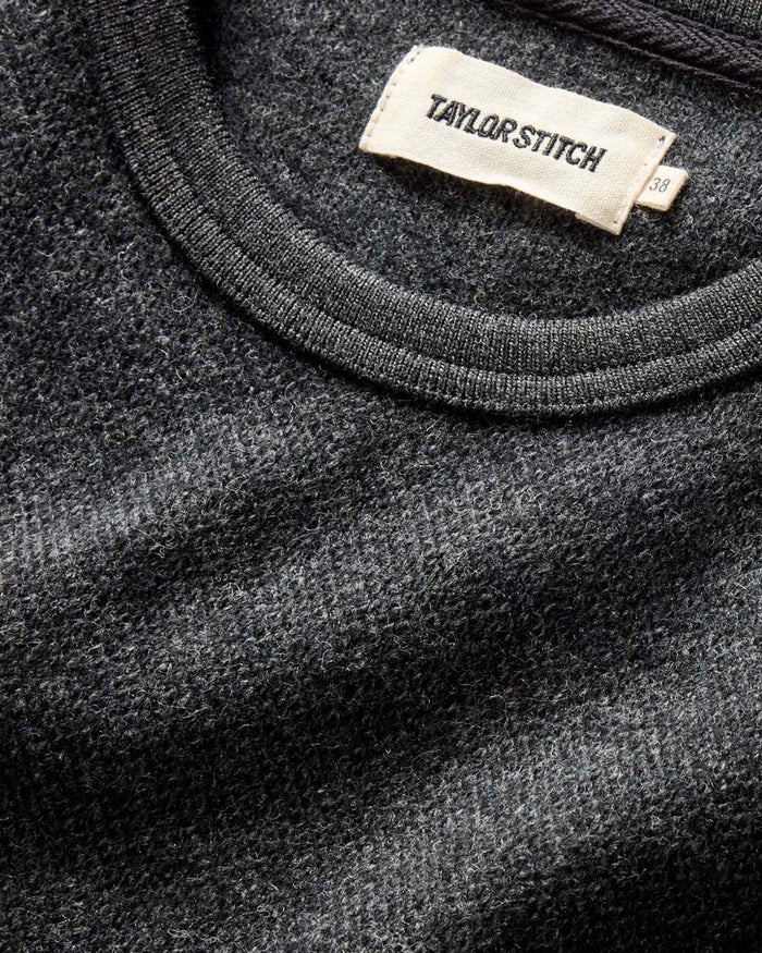 material shot of the ribbed neck opening on The Evans Crew in Charcoal Birdseye Wool