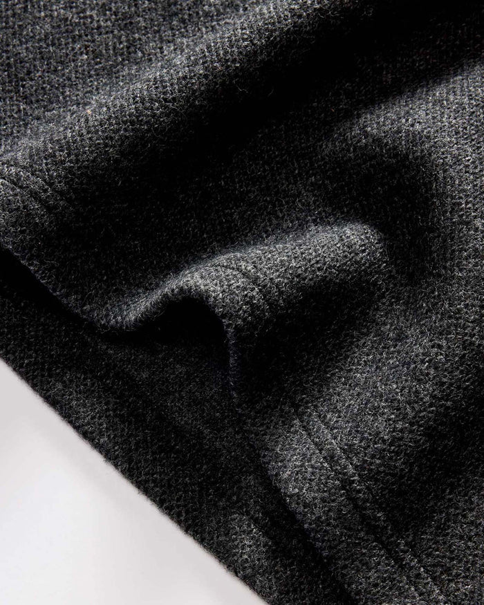 material shot of the hem on The Evans Crew in Charcoal Birdseye Wool
