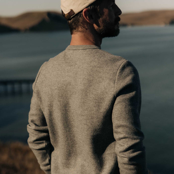 fit model showing off the back of The Evans Crew in Dark Ash Birdseye Wool