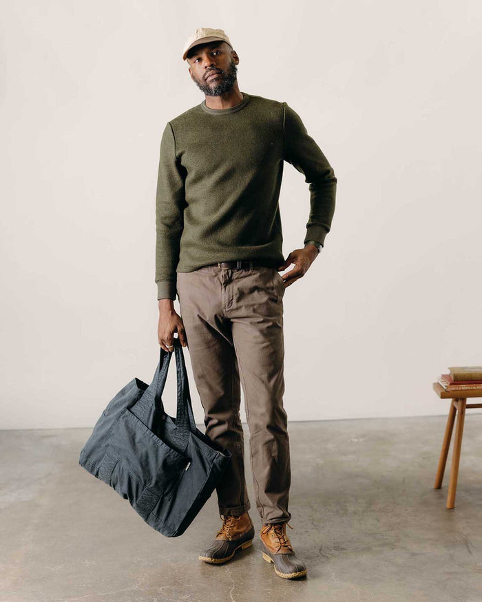 fit model standing wearing The Evans Crew in Forest Birdseye Wool