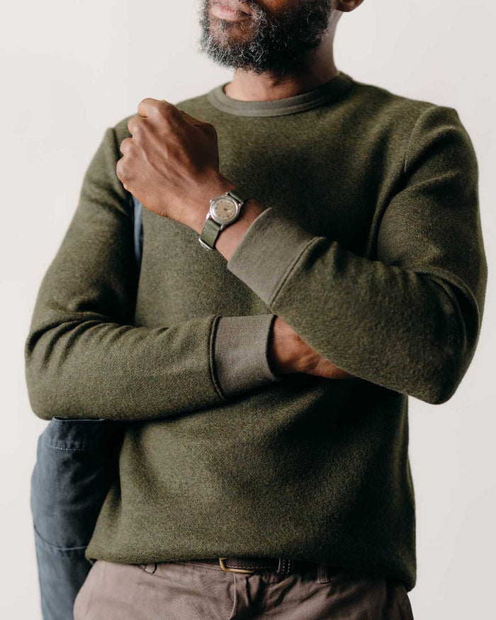 fit model showing off cuffs on The Evans Crew in Forest Birdseye Wool