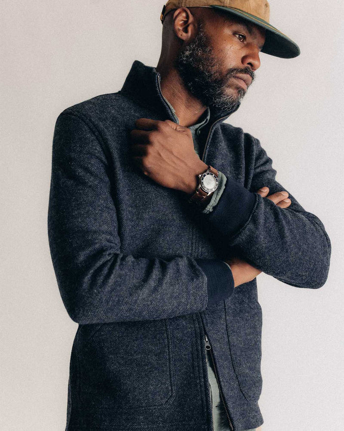 fit model posing in The Evans Jacket in Navy Birdseye Wool