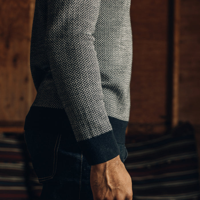fit model showing the side of The Everett Sweater in Navy Birdseye