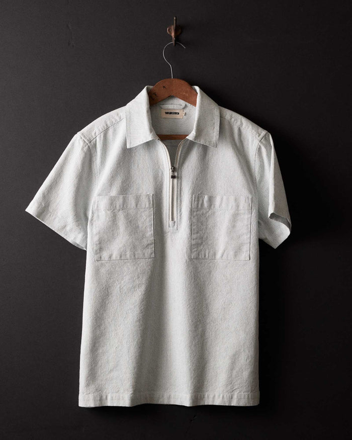 editorial image of The Exhaust Shirt in Natural Stripe hanging