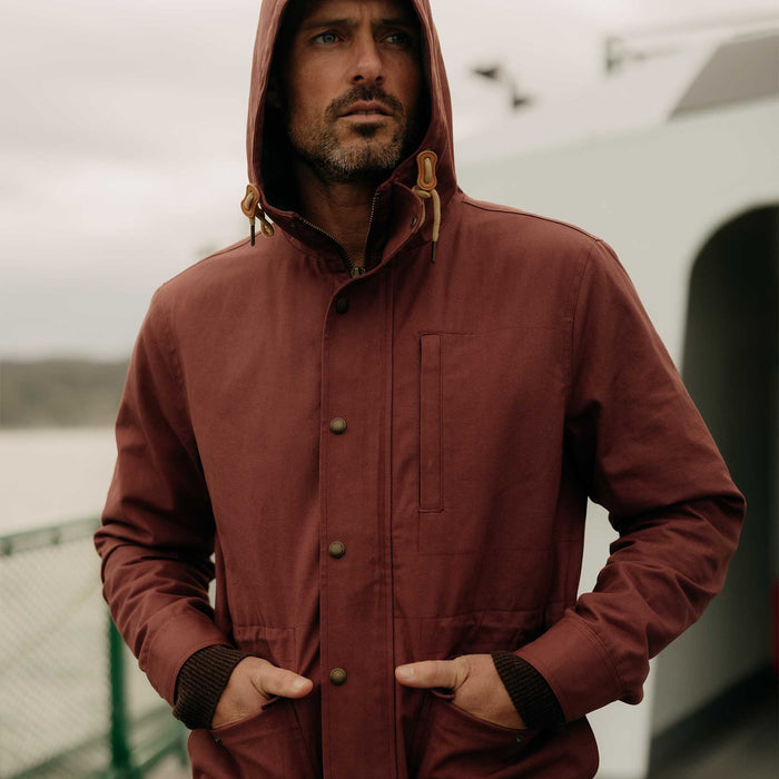 fit model with his hands in The Explorer Jacket in Red Wine Dry Wax