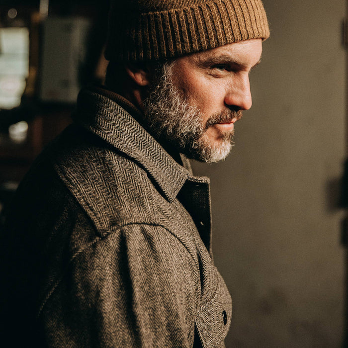 fit model wearingThe Explorer Shirt in Charcoal Herringbone, looking right