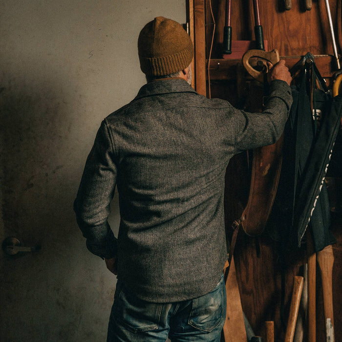 fit model wearingThe Explorer Shirt in Charcoal Herringbone, back shot