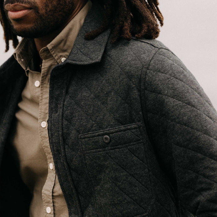 fit model showing off the collar on The Fall Line Overshirt in Heather Coal Quilted Jersey