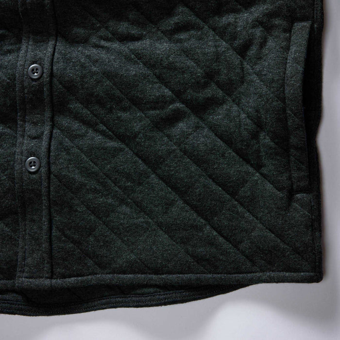 material shot of the pockets of The Fall Line Overshirt in Heather Coal Quilted Jersey