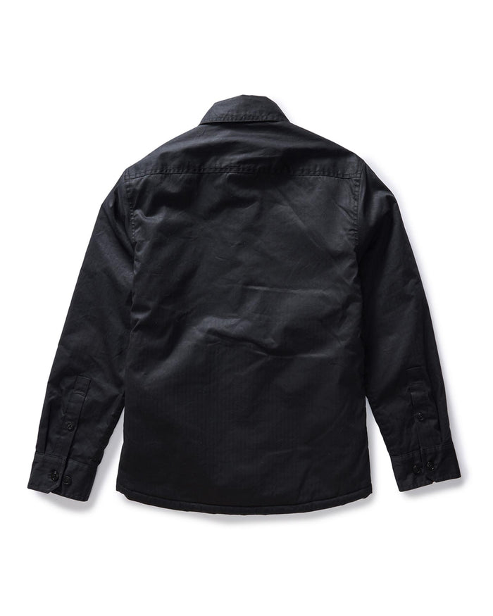 flatlay of the back of The Fender Jacket in Coal Dry Wax