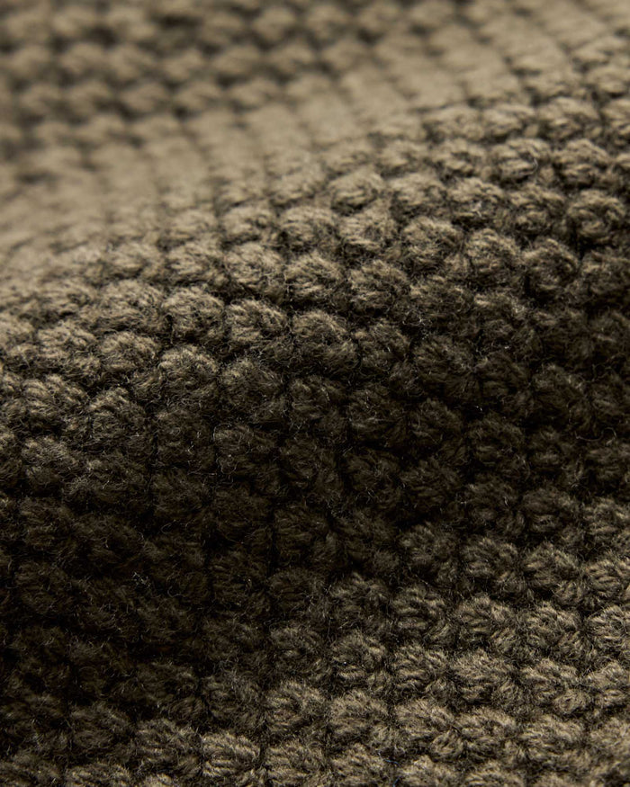 material shot of the fabric on The Fisherman Beanie in Heather Army