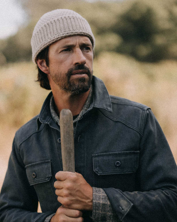 fit model posing in The Fisherman Beanie in Heather Fog