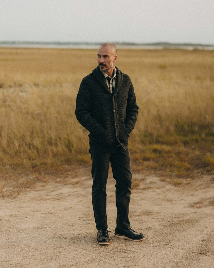 fit model showing off The Fisherman Shawl Cardigan in Heather Coal Merino