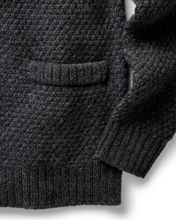 material shot of the sleeves on The Fisherman Shawl Cardigan in Heather Coal Merino