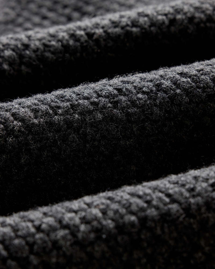 material shot of the fabric on The Fisherman Shawl Cardigan in Heather Coal Merino