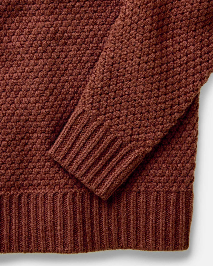 material shot of the sleeve on The Fisherman Sweater in Heather Brick Merino