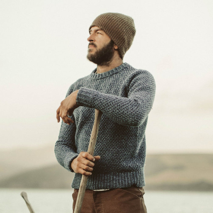 David out on the water in his Fisherman Sweater