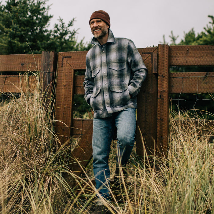 fit model with hand in pockets of The Forester Jacket in Ash Plaid