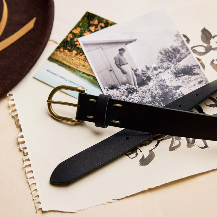 editorial image of The Foundation Belt in Black on a stack of paper
