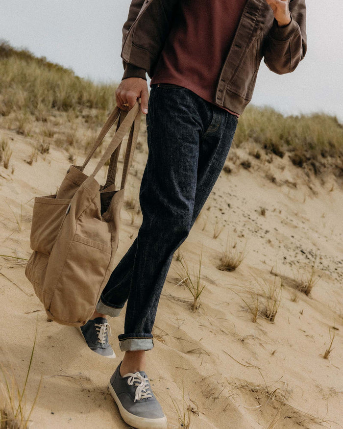 fit model walking wearing The Foundation Tote in Organic Khaki