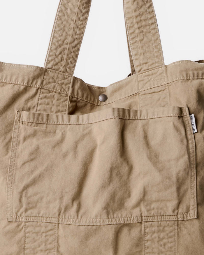 material shot of the front pocket on The Foundation Tote in Organic Khaki