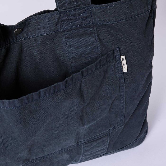 editorial image of the front pocket on The Foundation Tote in Organic Navy