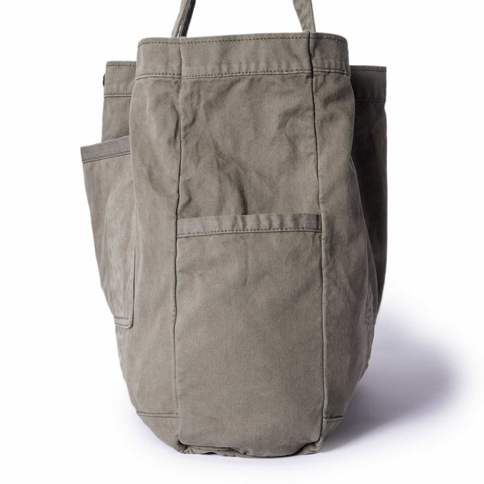editorial image of the side pocket on The Foundation Tote in Organic Smoked Olive