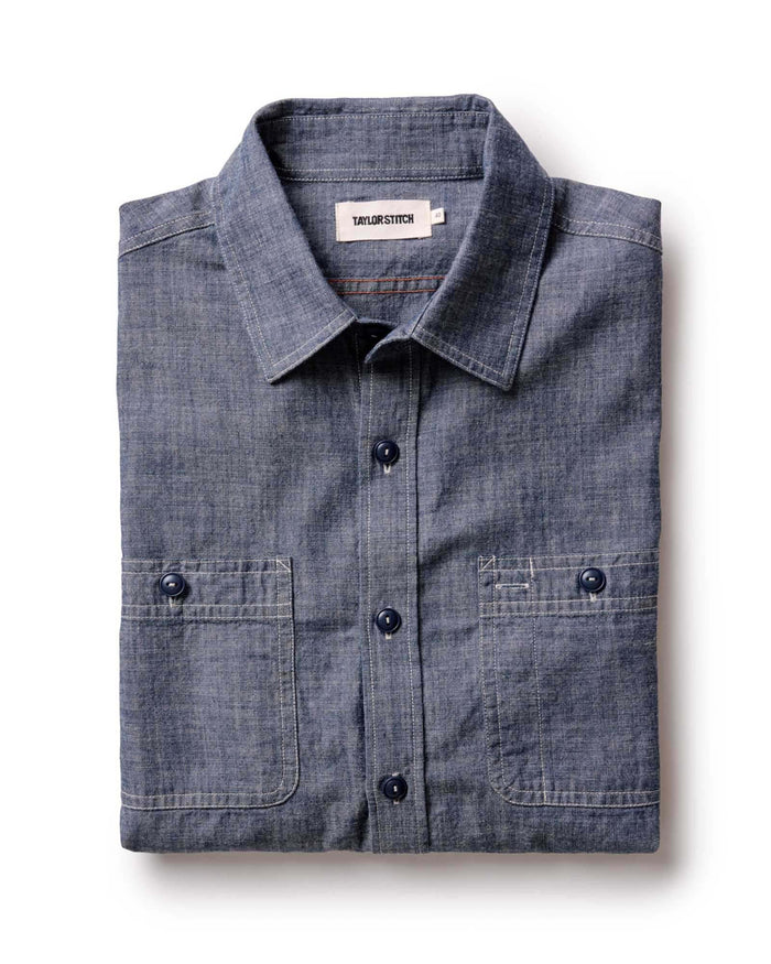 folded flatlay of The Foundry Shirt in Rinsed Indigo Chambray