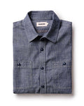 folded flatlay of The Foundry Shirt in Rinsed Indigo Chambray