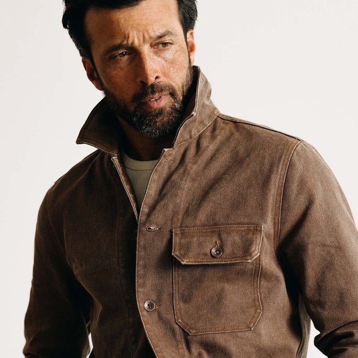fit model showing off the pocket on The Fremont Jacket in Aged Penny Chipped Canvas