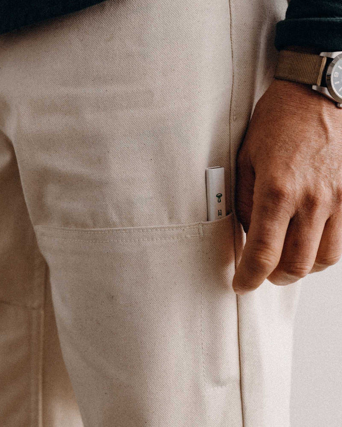 fit model showing off the double knee on The Good Acre Chore Pant in Natural Canvas