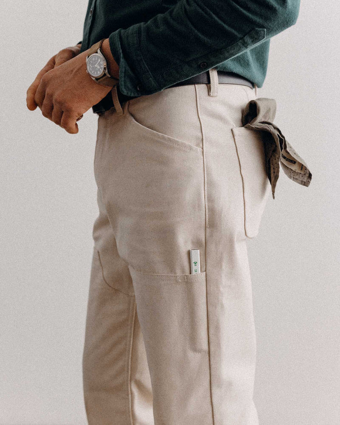 fit model posing in The Good Acre Chore Pant in Natural Canvas