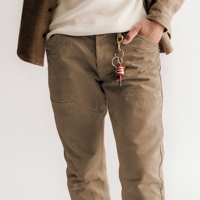 fit model posing in The Good Acre Chore Pant in Tan Canvas