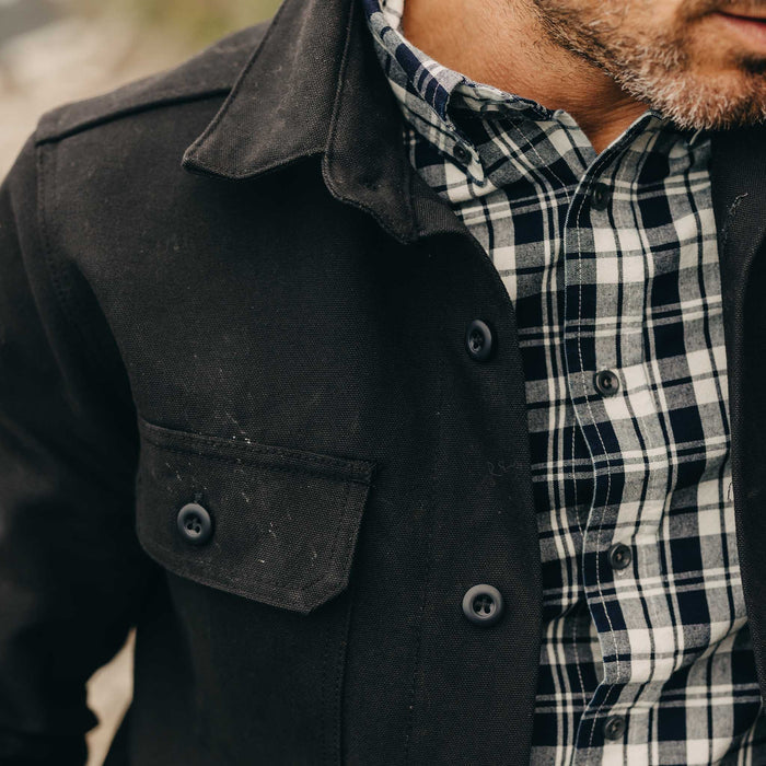 fit model showing off the pockets on The Good Acre Forge Overshirt in Black Canvas