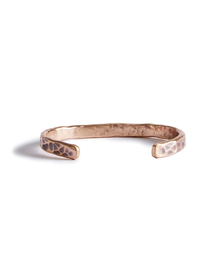 editorial image of the back of The Hammered Cuff in Copper