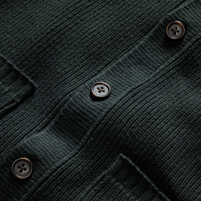 material shot of the horn-colored buttons on The Harbor Sweater Jacket in Black Pine Heather