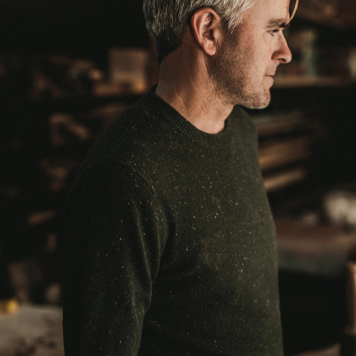 Our fit model woodworking in his garage